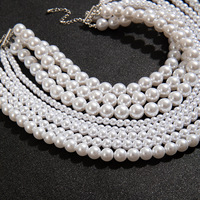 Collier long multicouche tendance en perles et pampilles imitation perle pour femme, idéal pour les soirées