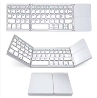 Clavier sans fil portable pliable avec pavé tactile, souris USB filaire, mini BT rechargeable et nouveau produit