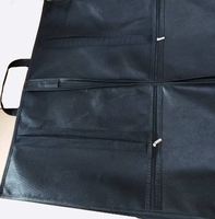Vente en gros de housses de voyage portables personnalisables non tissées anti-poussière sac de vêtements réutilisable avec fermetures à glissière pliable