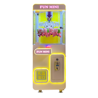 Mini machine à pince à prix amusante à pièces Machine de serrage de poupée cadeau commerciale Machine de jeu d'arcade à pince d'usine pour les enfants