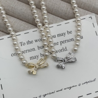 Nouveau collier pendentif rétro en laiton plaqué or avec perle chaîne de corde géométrique à la mode haut de gamme haut de gamme tempérament