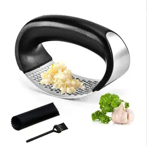 Amz 3 piece kitchen gadgets stainless steel Manual garlic press with silicone peeler and cleaning brush Garlic Crusher Press