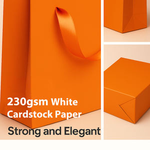 Tas Belanja Kertas Oranye dengan Pegangan Pita Sutra Cetak Logo Kustom Ramah Lingkungan Mewah untuk Butik Pakaian Hadiah - Product Image 3