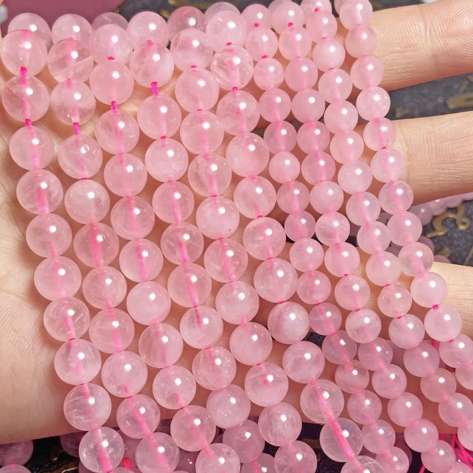 Vendita all'ingrosso di perle sciolte di pietre preziose di quarzo rosa naturale per la creazione di gioielli fai da te artigianato fatto a mano 12mm rosa perline