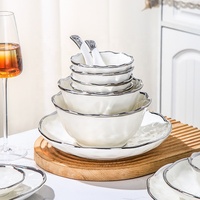 Service de vaisselle en céramique nordique moderne avec bordure argentée, assiettes et bols en porcelaine blanche de luxe pour la maison et les restaurants haut de gamme