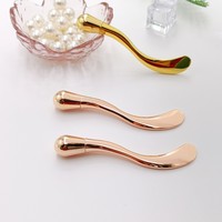 HZ Crème pour les yeux la plus vendue avec masseur, outil cosmétique en plastique avec spatule pour crème visage et applicateur beauté pour les yeux