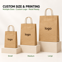Sacs en papier kraft personnalisés avec poignées torsadées pour les boutiques de vêtements streetwear, les magasins de chaussures et la vente au détail de mode