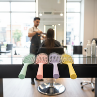 A16 Meilleure vente Outil de coiffure Peigne de massage à coussin d'air à dents en nylon, manche en plastique, ventilation creuse, dents flexibles
