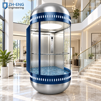 Ascenseur panoramique en verre rond avec construction en acier inoxydable, design moderne, durable et sûr pour usage domestique et commercial