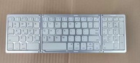 Clavier de jeu sans fil BT portable ultra-fin et mince, style chaud, pavé tactile pliable pour tablette PC, clavier pliable ultra-fin