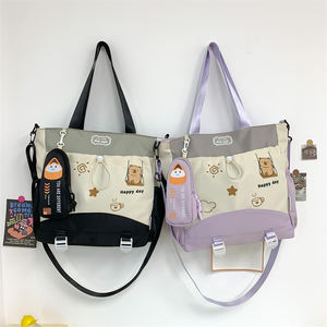 Venta caliente moda lindo patrón chica impermeable cremallera frontal bolsillo mensajero mujeres bolso de compras con colgante de felpa - Product Image 6