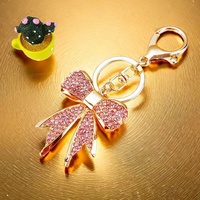 Noeud papillon personnalisé broderie fête Bling sac à main breloque sac à dos strass gonflé personnalisé porte-clés accessoires et bracelets