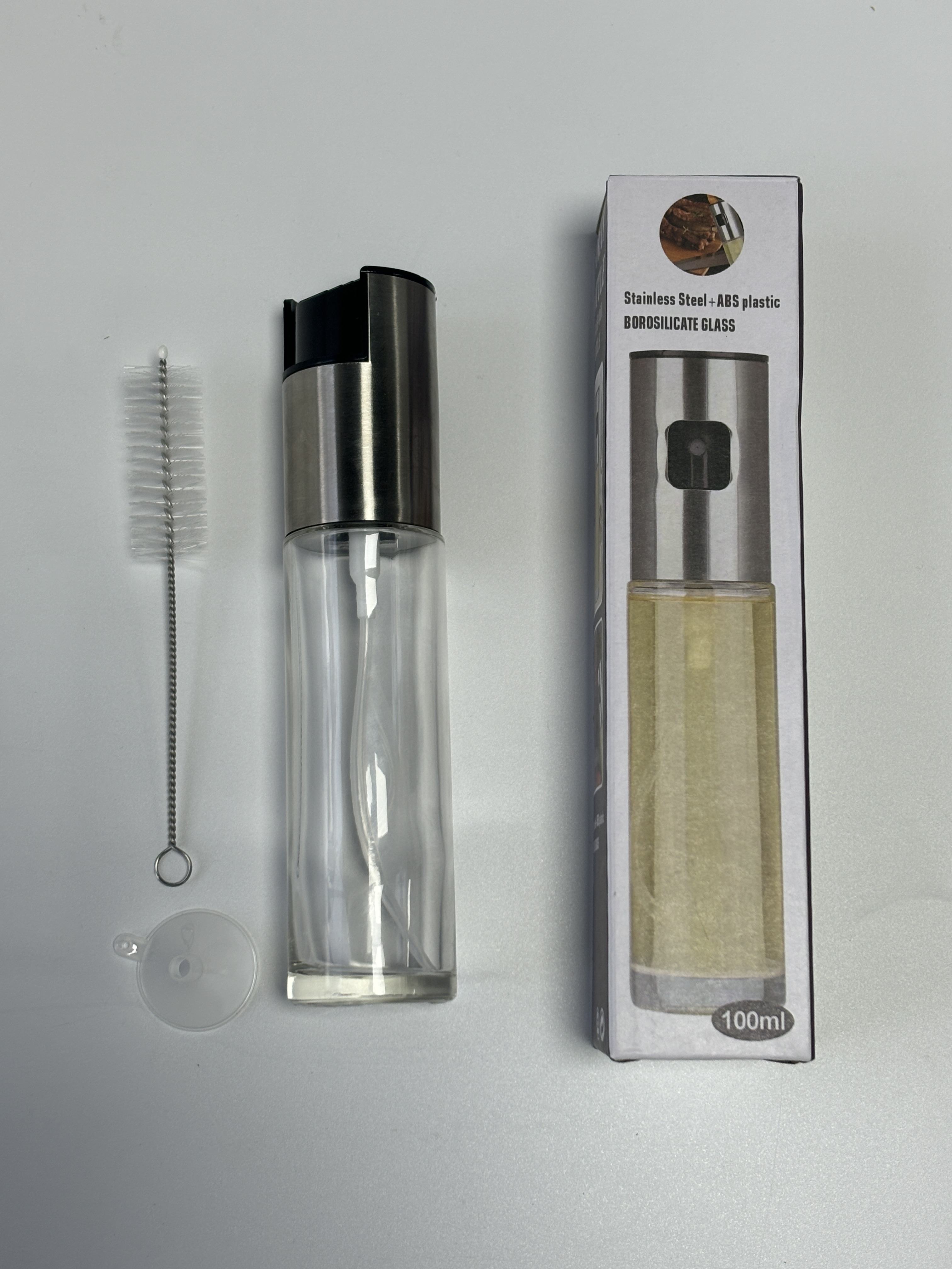 oil bottle + funnel + brush