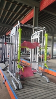 Entraîneur de câble de poulie réglable multifonctionnel de gymnastique commerciale Smith Machine équipement de gymnastique à domicile support de Squat de puissance