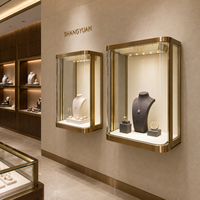 Vitrine murale sur mesure pour bijoux, verre incurvé, acier inoxydable doré, LED, pour boutique de bijoux de luxe