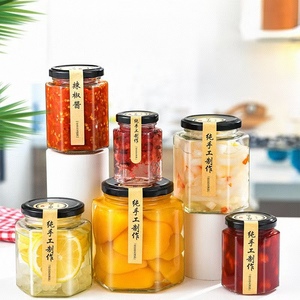 Nouveau pot de conservation cylindrique Clea280ml en verre borosilicate de qualité alimentaire, forme nid d'abeille unique, avec cuillère en bois, couvercle en bambou et métal - Product Image 1