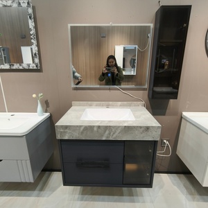 Blue-gray bathroom cabinet with a side transparent display vertical cabinet stone countertop and white washbasin - Product Image 1