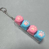 Breloque porte-clés Macaron colorée en forme de patte, bouton de clavier anti-stress, jouet amusant et mignon, breloque de sac, jouet pour les doigts
