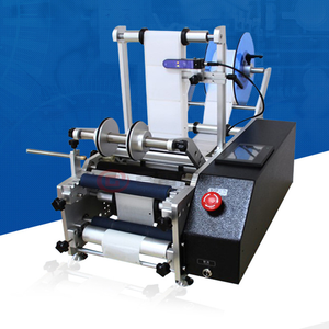 Les boîtes de conserve sont étiquetées manuellement par une machine d'étiquetage manuelle portable ou une machine d'étiquetage semi-automatique à étiquettes plates. - Product Image 5
