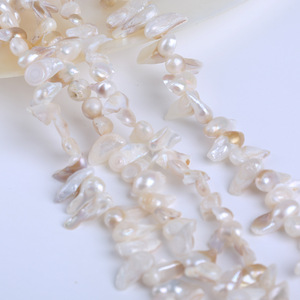 Venta Directa de Zhuji, Perla Natural Barroca Blanca de 5-7 mm, Cabeza Irregular con Orificio, Concha con Cola de Perla Adjunta, Procedente de Granja de Cultivo de Perlas - Product Image 3