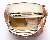 Sac à dos multifonctionnel élégant en cuir végétalien imperméable à l'eau maman papa voyage sac de maternité sacs pour bébés pour les soins des nourrissons