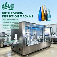 Équipement d'inspection industrielle automatisé en ligne pour le contrôle visuel et l'élimination des produits non conformes des bouteilles en plastique (boissons, cosmétiques)