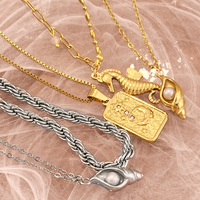Collier en acier inoxydable plaqué or 18 carats avec pendentif hippocampe, escargot de mer, étoile et lune, chaîne tendance pour femme, cadeau