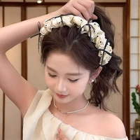 Aksesoris rambut penjepit rambut model high top baru dengan hiasan kepala bergigi dan desain lilitan