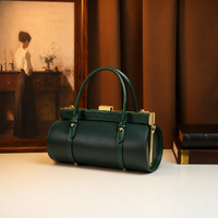 Sac cylindrique noir à imprimé serpent avec logo personnalisé, en cuir PU, fermoir à cadre métallique, sac à bandoulière et sac à main, fournisseur en gros