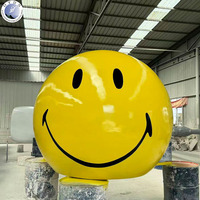 Sculpture de boule en fibre de verre avec visage souriant, statue en résine sur mesure grandeur nature, décoration de jardin, parc, paysage extérieur pour usage commercial
