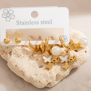 Juego de pendientes colgantes de acero inoxidable con diseño de cruz y girasol, chapados en oro de 18 quilates, de acero titanio para mujer, joyería de moda. - Product Image 2