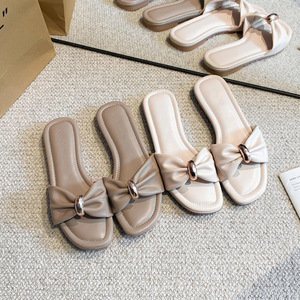 Nuevas sandalias planas transpirables y suaves de primavera/verano para mujer con lazo y hebilla metálica, diseño cómodo y elegante para exteriores. - Product Image 3