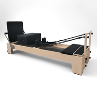 Reformer de Pilates en bois d'érable avec logo personnalisé, capacité de charge de 200 kg, lit d'entraînement pour le renforcement musculaire, équipement de yoga et de fitness pour studio