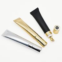 Nieuwe verpakking glanzende lipolië in zilver en goud, vegane lipgloss in knijptube, private label, op maat gemaakte lipolië