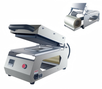 Voedseltray verpakkingsmachine, traysealmachine, traysealer voor het sealen van verpakkingen van snel gekookt, gebakken voedsel, vleeskommen, trays op maat gemaakt