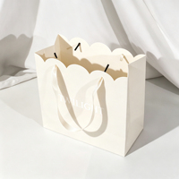 Sacs en papier personnalisés de luxe pour cadeaux, sacs de mariage pliables écologiques de haute qualité avec design gratuit