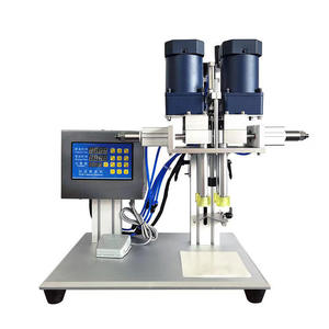 Máquina taponadora giratoria Máquina taponadora cosmética neumática Máquina taponadora de cabezal de bomba manual de escritorio pequeña - Product Image 1