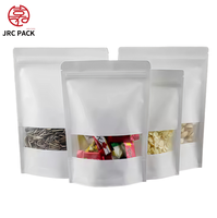 Sacs d'emballage en papier kraft blanc refermables de haute qualité avec fenêtre et logo personnalisé, conçus pour les aliments, les bonbons et les collations.