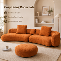 Sofa Modular Boucle Warna Oranye Terang dengan Kain Bertekstur Lembut, Bantalan Dalam yang Luas, Siluet Melengkung, Termasuk Ottoman yang Serasi untuk Rumah