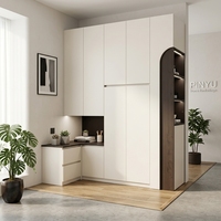 Armoire de chambre murale intégrale en composite avec bureau d'angle intégré, rangement supérieur et miroir, finition crème clair