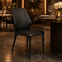 Chaises de salle à manger texturées à dossier fini en noir suie, avec pieds en métal élancés et coussin d'assise moelleux, pour café artisanal et restaurant de jardin