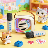 Nouveau haut-parleur karaoké mini 7W avec lumières LED RVB, connectivité sans fil intégrée, 2 micros pour intérieur et extérieur / Cadeau pour enfants YF93