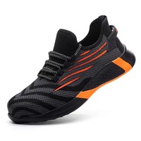 Chaussures de travail de sécurité respirantes à bout en acier tissé à la mouche pour femmes à la mode Botte de construction à semelle souple en caoutchouc antidérapante pour travailleur