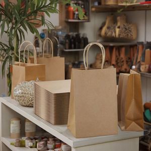 Wholesale Portable Kraft <b>Paper</b> Bag Durable Tote <b>for</b> Clothing Shoes Socks <b>Packing</b> Popular Gift Craft with Hot Stamp Offset Print - Product Image 4