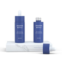Verre à essence gris bleu rose 30 ml 1oz flacon compte-gouttes à bouton-poussoir emballage en verre flacon compte-gouttes à presse à huile pour les yeux