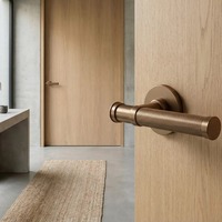 Poignée de porte intérieure symétrique en laiton brossé or rose antique pour entrée d'appartement ou de chambre d'hôtel