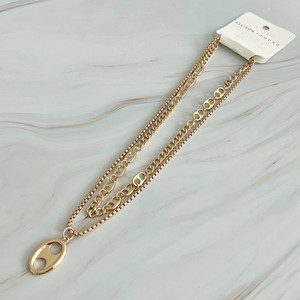 Ensemble de colliers avec breloques en forme de bouton dorés - Product Image 5