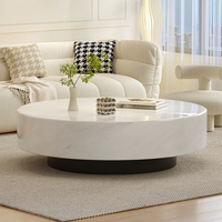 Table basse en marbre italien, de forme ronde, adaptée au salon, à un usage domestique, design minimaliste, style haut de gamme, couleur crème