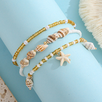 Bracelets à breloques coquillages et étoiles de mer, perles ambre, or et blanches, ensemble de bijoux thème océan et plage, cadeau pour femme