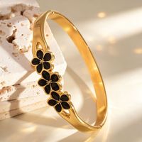 Gelang Bangle Fashion Wanita Trendy Lapis Emas 18K Bahan Stainless Steel Motif Bunga Terbuka